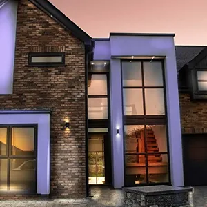 A large brick house with a lot of windows.